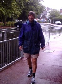 John arrives in the rain!